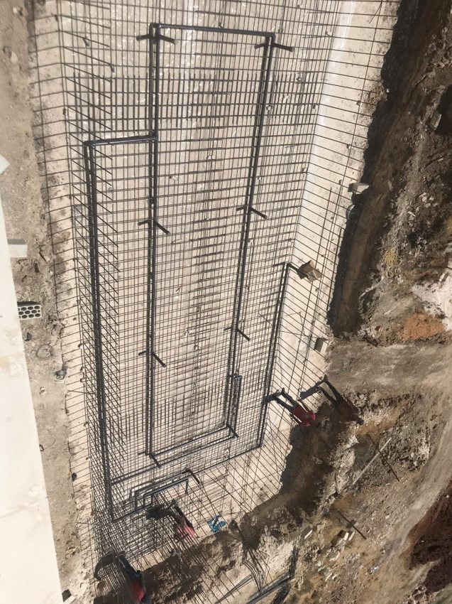 Pool construction showing reinforcement and embedded plumbing